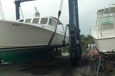 The Lowell being lifted from the water