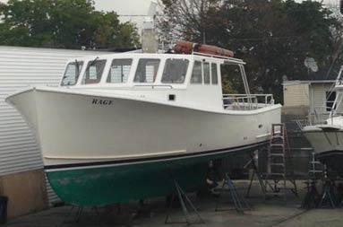 The boat sitting in the lot of Atlantic Service and Equipment