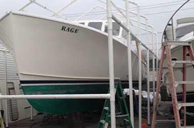 PVC pipes build a frame for the tent structure that will house the boat during the winter months