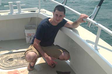 The guy gets his fish over onto the deck of the boat
